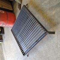 Réalisation d'une grille en acier d'aire de lavage avec ancrage